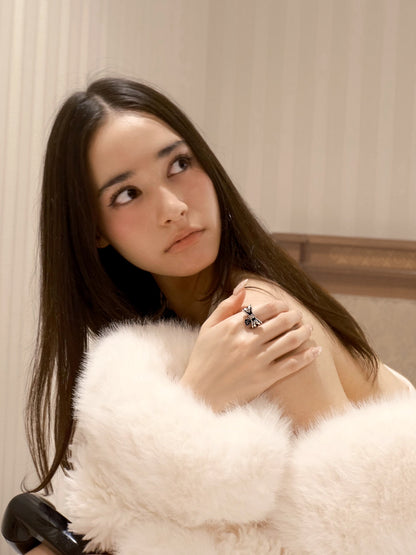 Oxidized 925 silver bow ring worn 